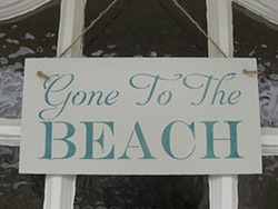 Gone to the beach wooden sign